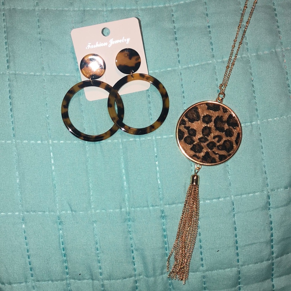 Tortoise earring w/ leopard print tassel necklace.